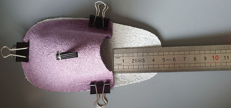 assembly of leather slippers