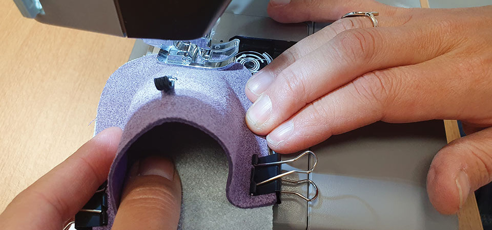 sewing on slippers