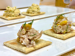 Tuna and Egg salad with fresh dills on crackers