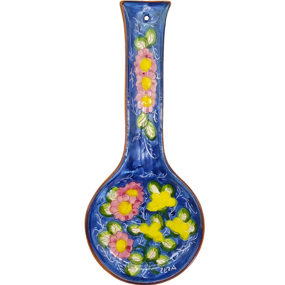 https://cdn.shopify.com/s/files/1/0569/9194/0784/products/Hand-Painted-Portuguese-Pottery-Floral-Ceramic-Spoon-Rest_1.jpg?v=1646949838&width=1080