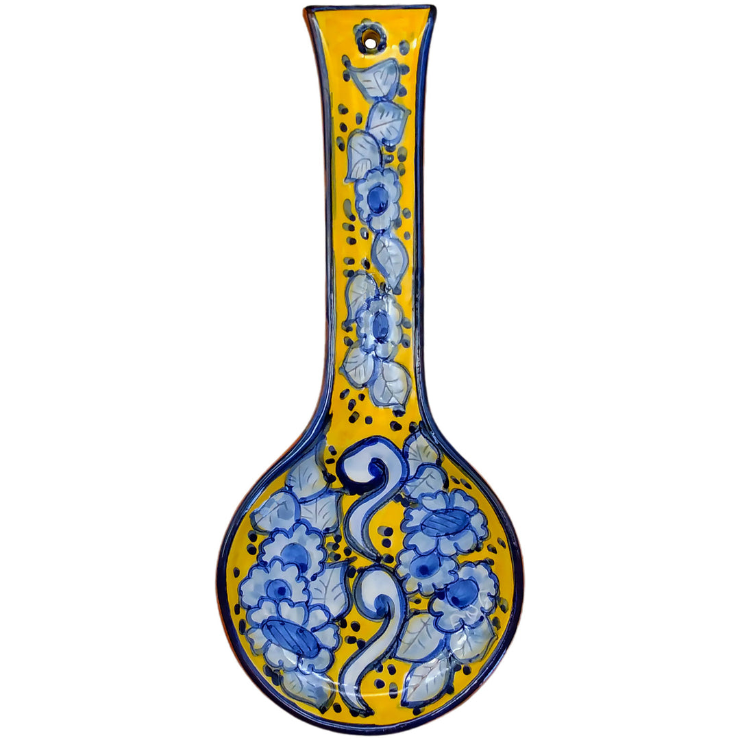 https://cdn.shopify.com/s/files/1/0569/9194/0784/products/Hand-Painted-Portuguese-Pottery-Yellow-and-Blue-Ceramic-Spoon-Rest_1.jpg?v=1646949991&width=1080