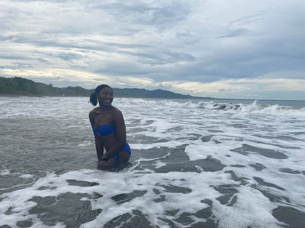 Solo travel woman on a beach in Puerto Viejo Costa Rica