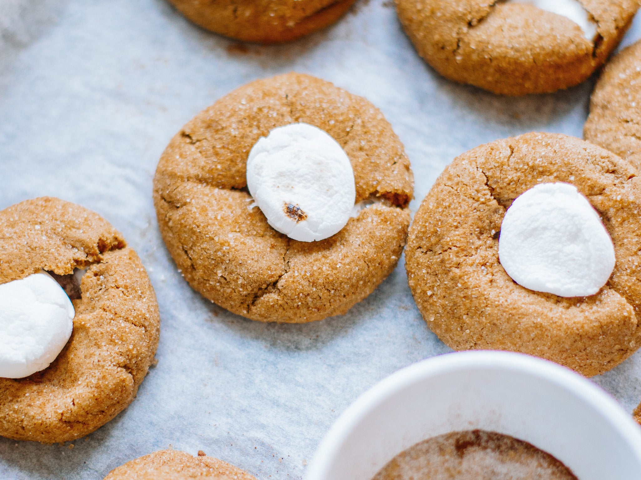 Marshmallow Peanut Butter Cookies on a pan lined with parchment paper