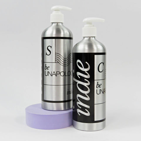 aluminium refillable shampoo and conditioner bottles silver and black with indie logo
