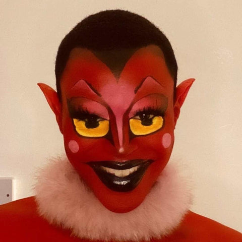 miguel in HIM for powerpuff girls inspired red makeup with yellow eyes