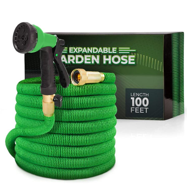 A green and black garden hose coiled in front of a green and black box