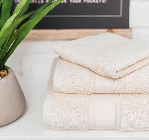 https://cdn.shopify.com/s/files/1/0569/9675/7697/files/organic-hand-towels_600x600.jpg?v=1668828418