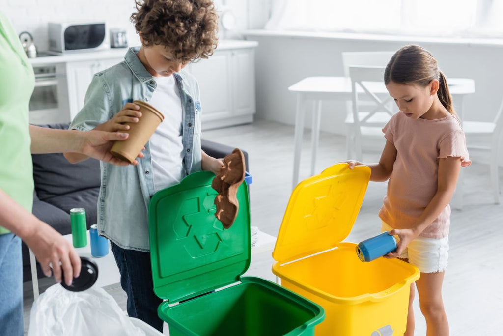 Kids sorting out recycling at home