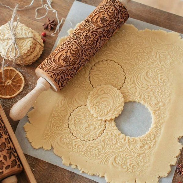 Embossed rolling pin on cookie dough