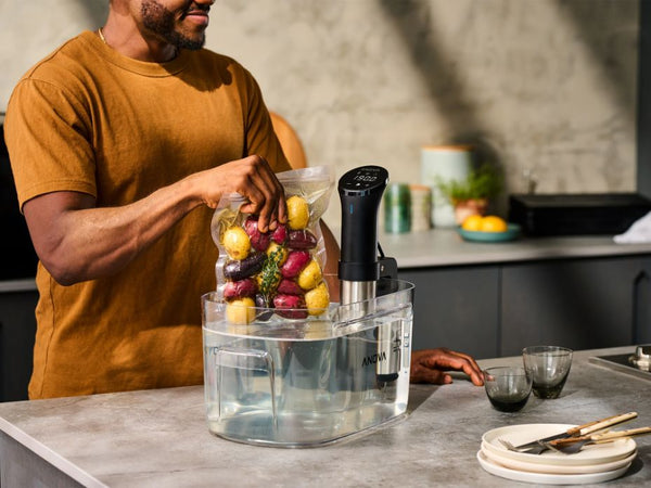 Man cooking with precision cooker