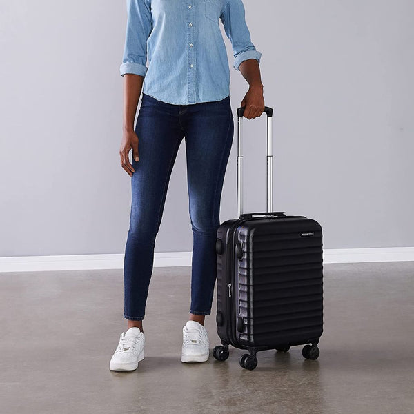 Woman holding suitcase