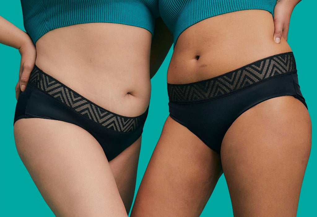 A couple of women posing in Thinx period underwear