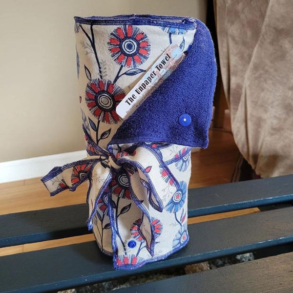 A roll of paper towels with a red, blue and white pattern on them