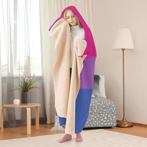 woman wearing bisexual pride hooded blanket