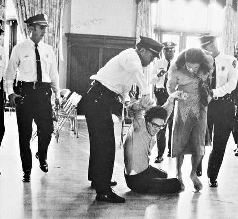 lgbt being arrested black and white 1970s photo