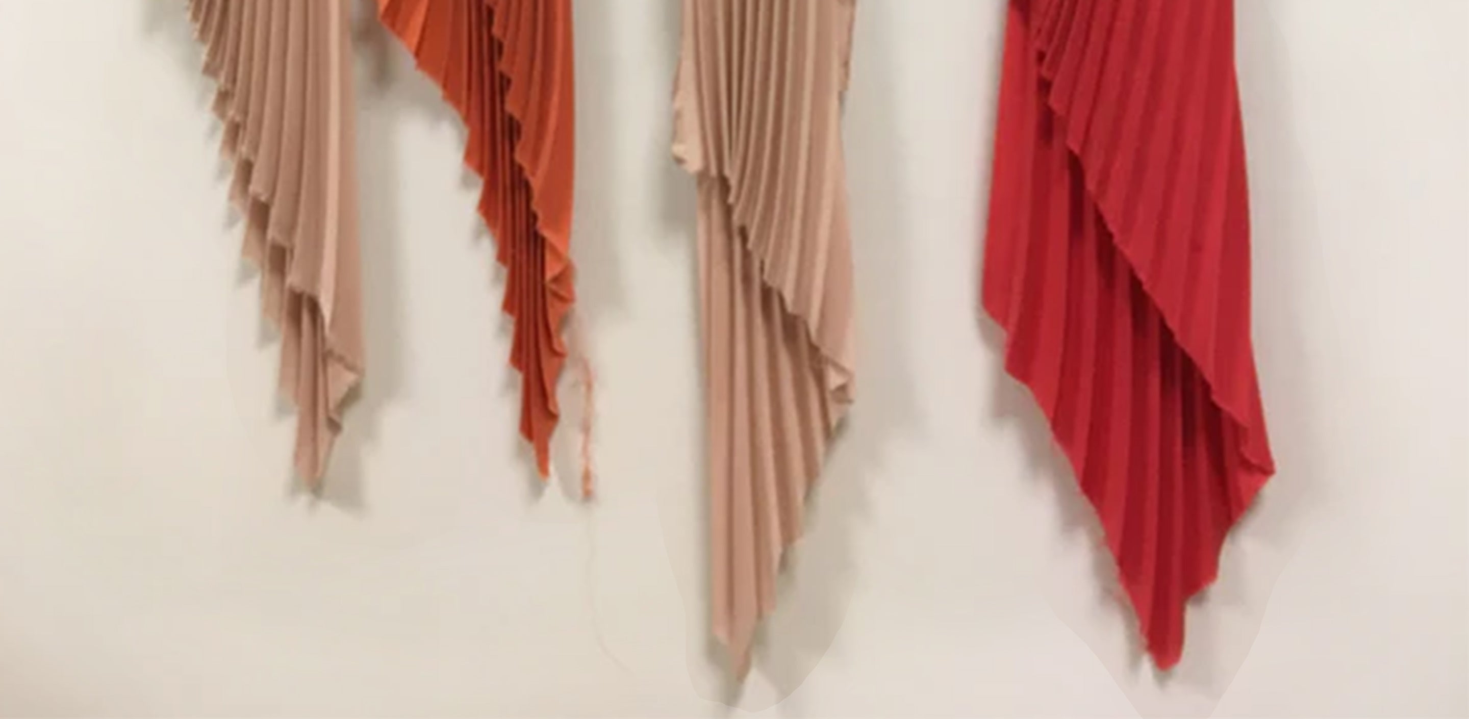 pink and orange pleated silk