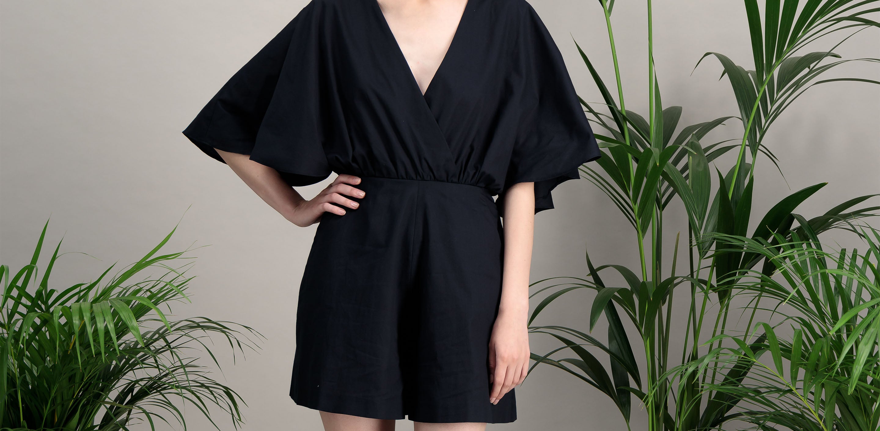 navy blue cotton poplin playsuit, flared sleeves and wide shorts