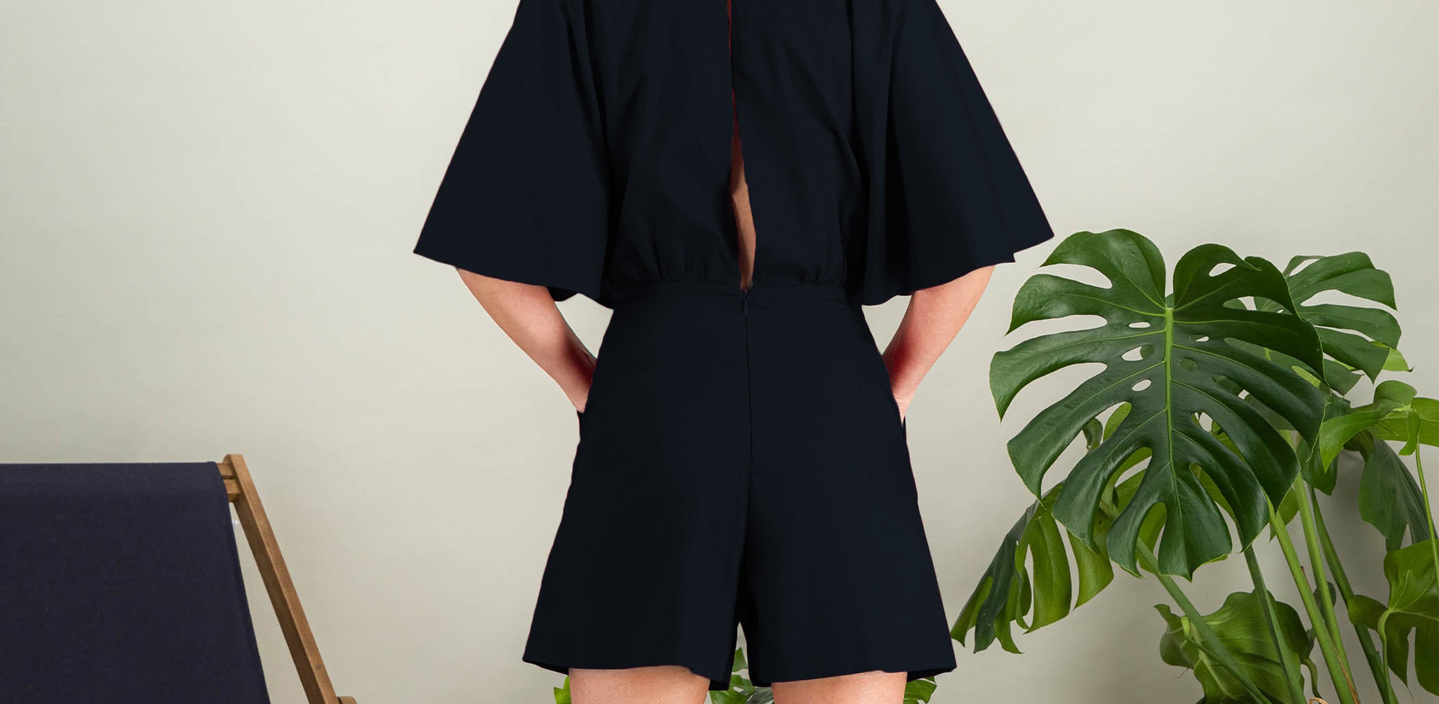 Navy cotton poplin short jumpsuit with butterfly sleeves, back view