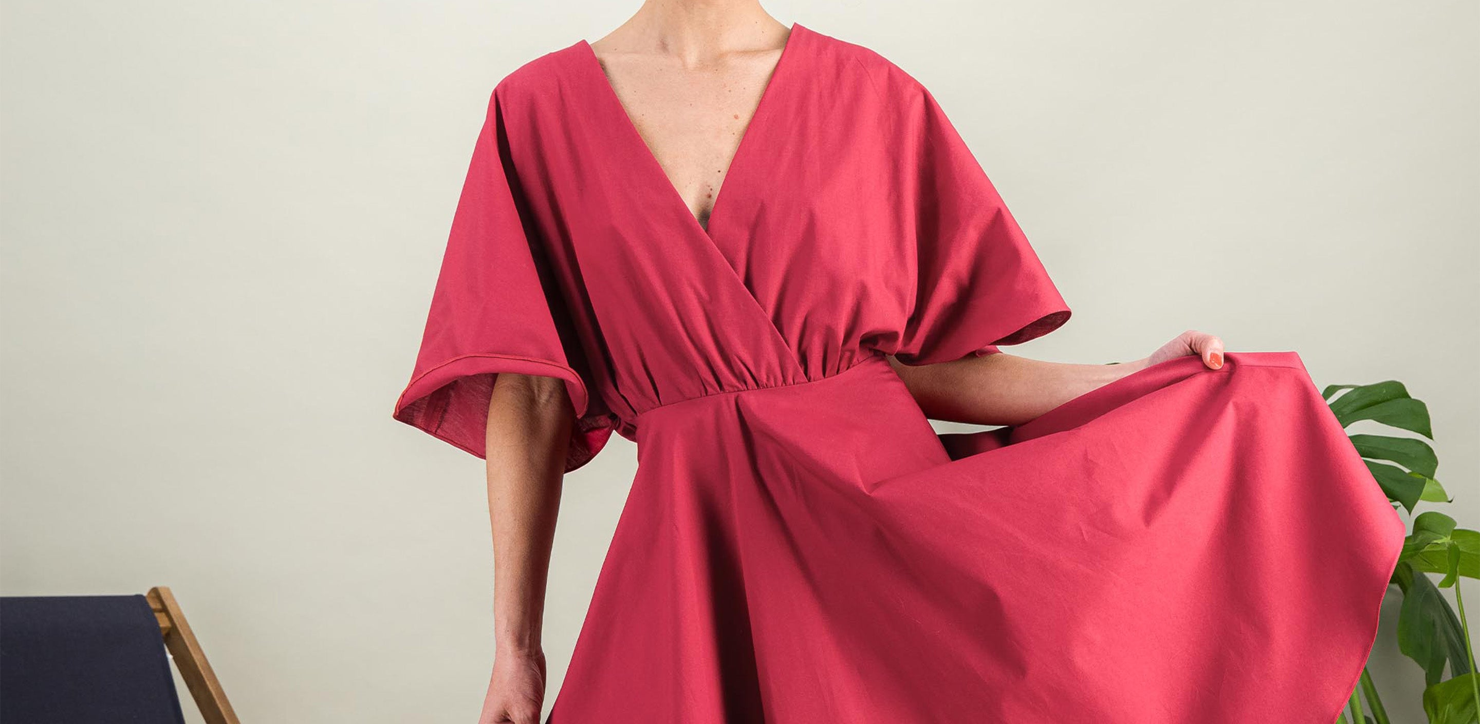 pink flared dress with wrap neckline and flared sleeves ideal for h shape