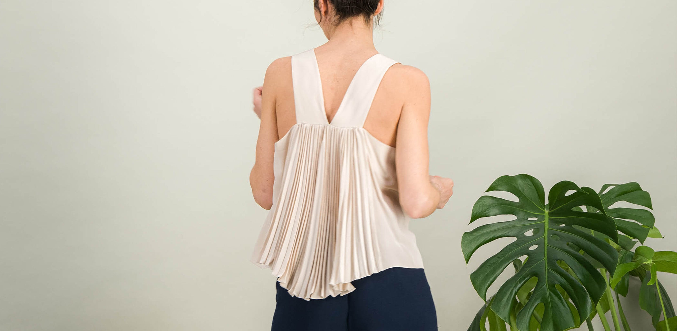 AMAYA ceremony top in beige pleated silk, back view