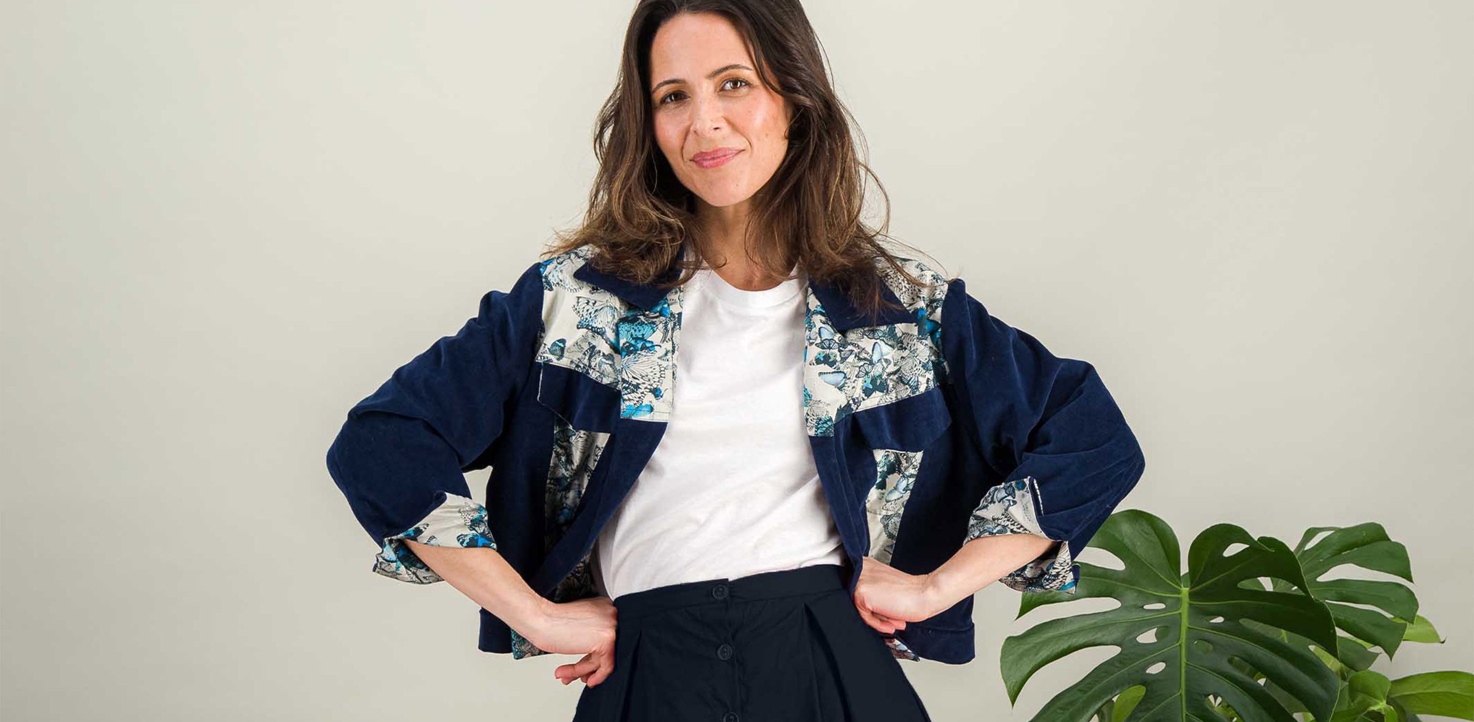 navy blue velvet jacket and its silk details with butterfly pattern