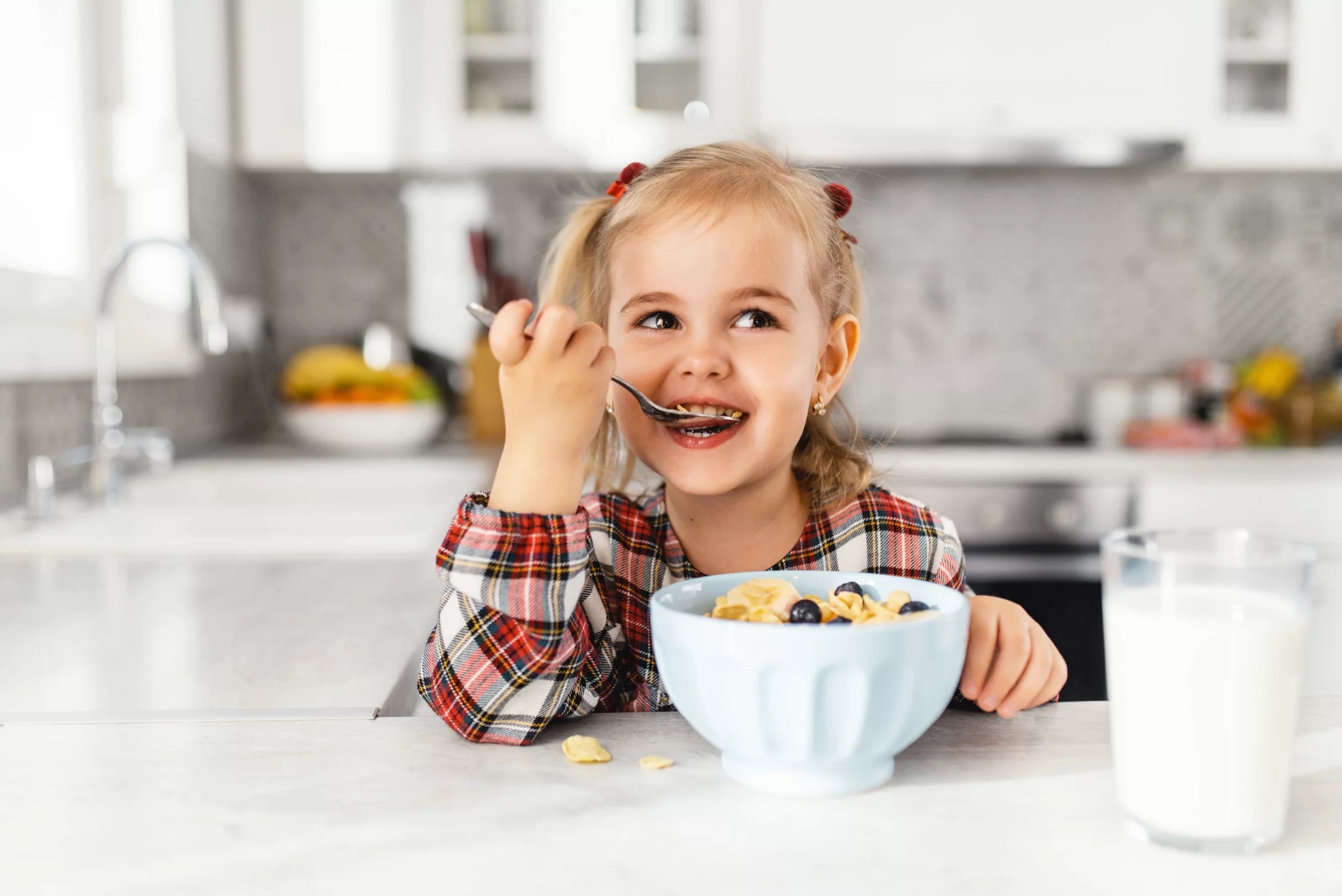 A girl eating cereal