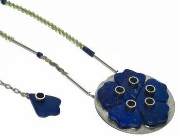 Lapis mandala neckpiece off set with lime green peridot. My favourite colour combo!