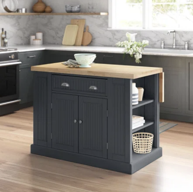 https://cdn.shopify.com/s/files/1/0570/1117/5539/t/10/assets/swanscombe-solid-wood-kitchen-island-1696390971982_1000x.png?v=1696390973