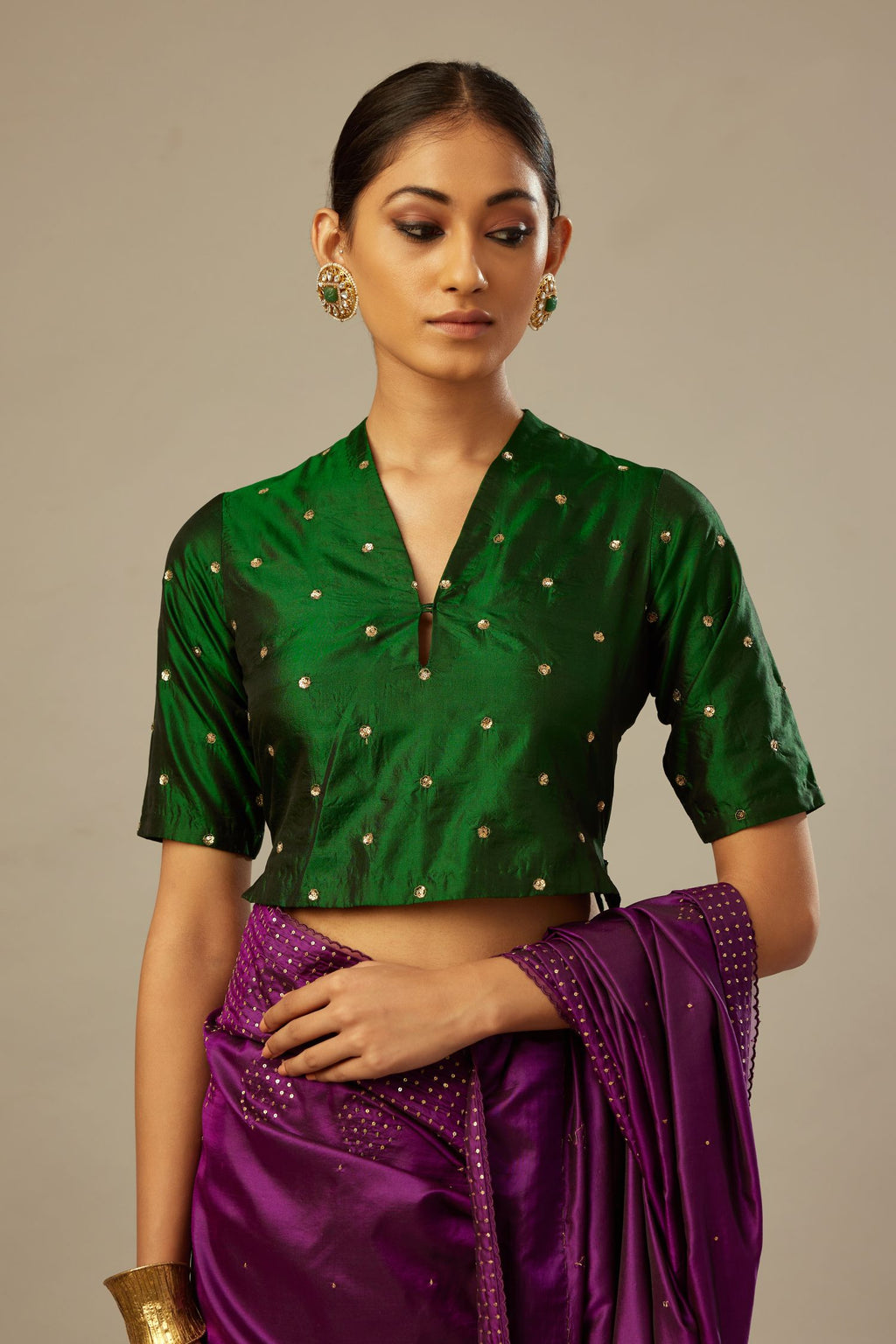 Dark green silk easy fit blouse with a raised V neck and all-over ...