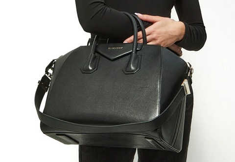 girl wearing a black givenchy antigona bag