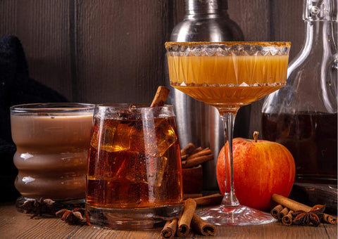 Maple syrup autumn cocktail. Boozy strong alcohol with apple cider and cinnamon syrup for beginner cocktail enthusiast.