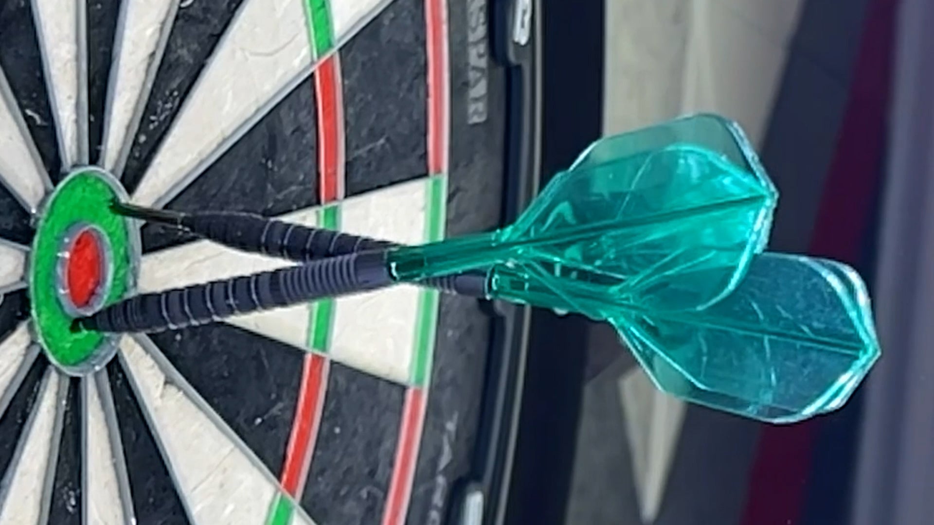 Target K Flex green flexing on two darts