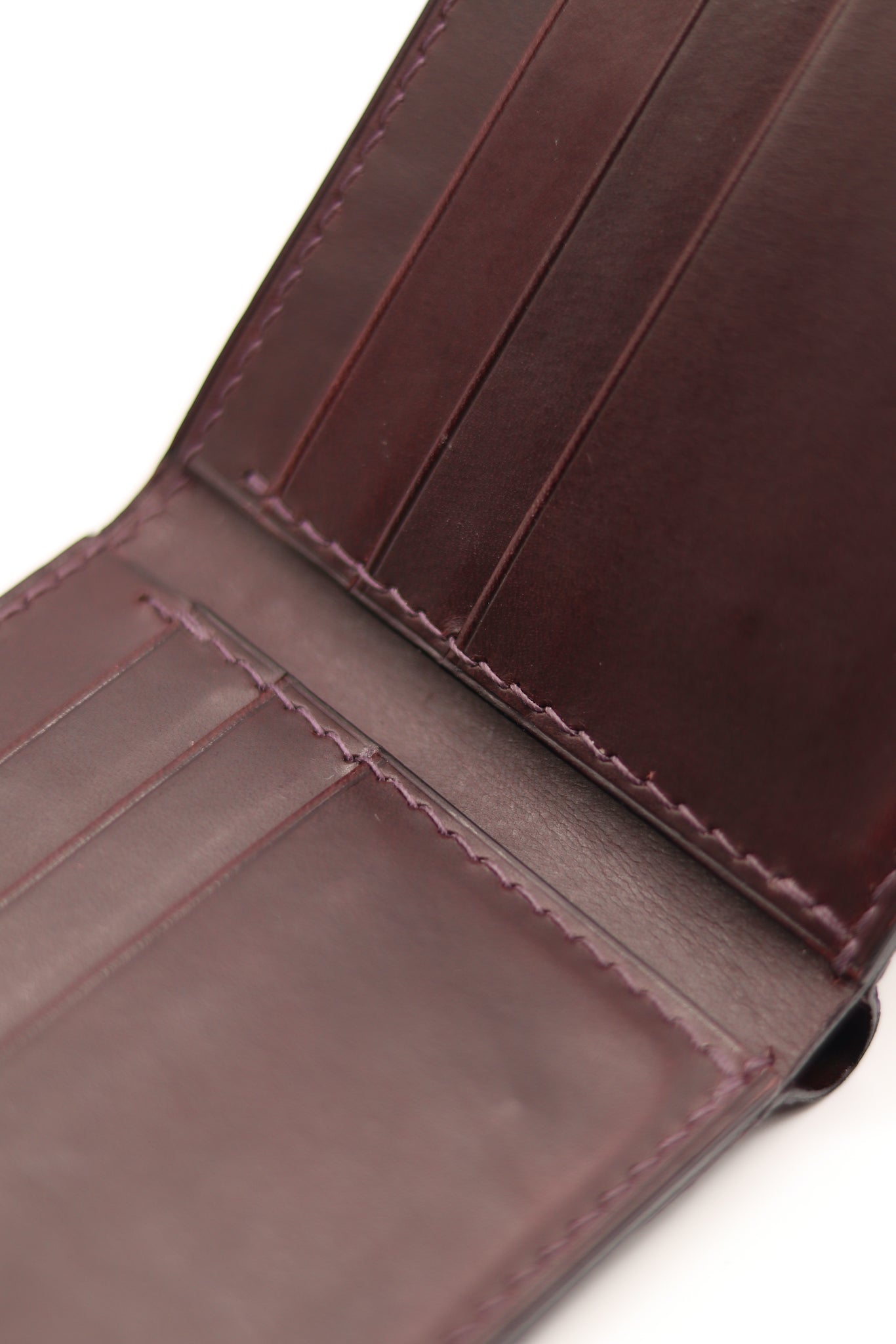 Full Grain Buttero Burgundy Leather Stitching Detail