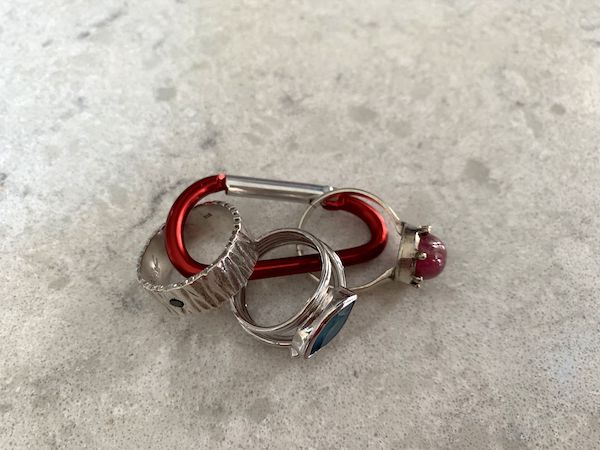 how to use carabiner to pack and travel with rings jewelry