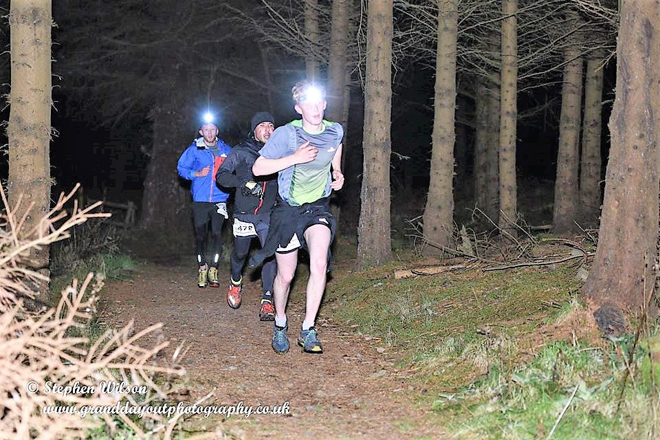 Runners at High Terrain Events Glentress Night Run