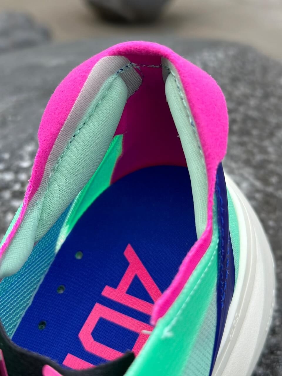 Close up of adidas Adizero Pro 3 running shoe in Pulse Mint colourway
