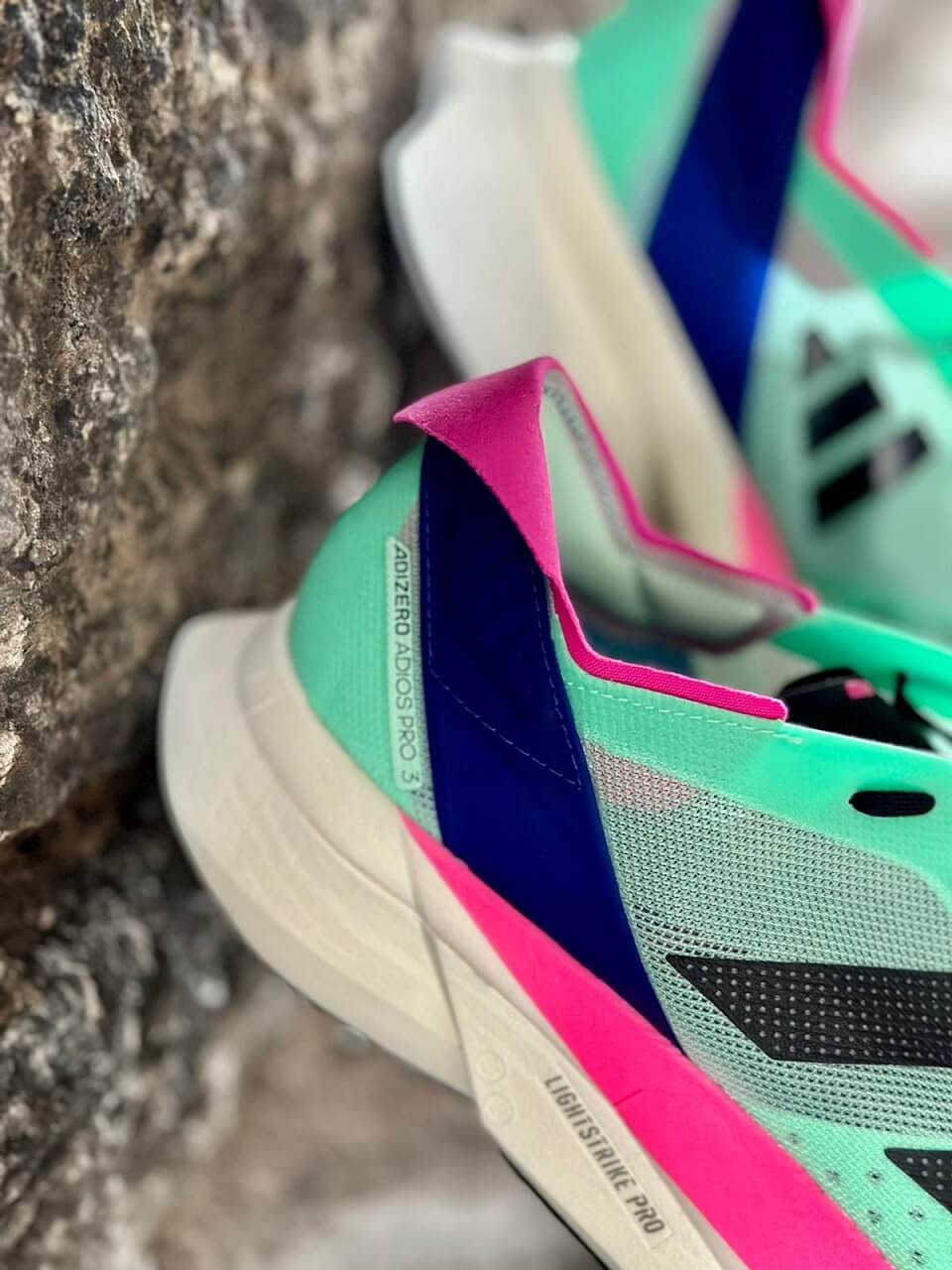Close up of adidas Adizero Pro 3 running shoe in Pulse Mint colourway