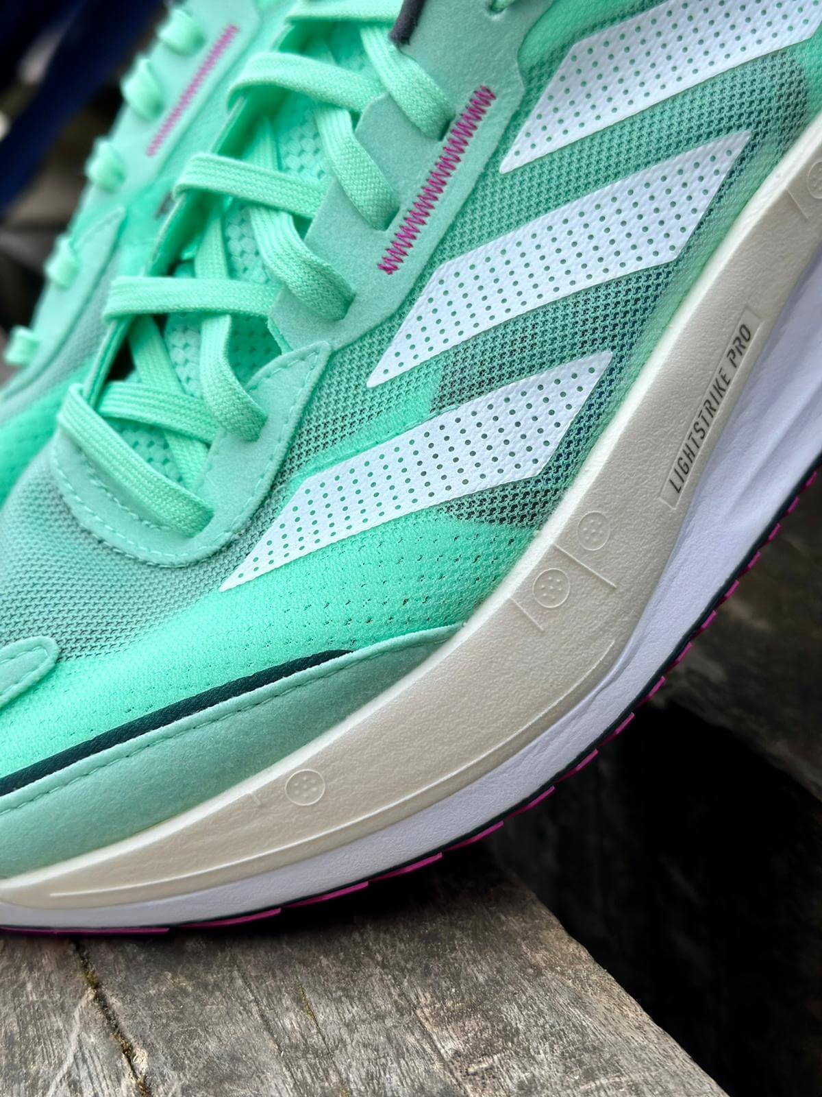  Upper of adidas Adizero Boston 11 running shoe in Pulse Mint colourway