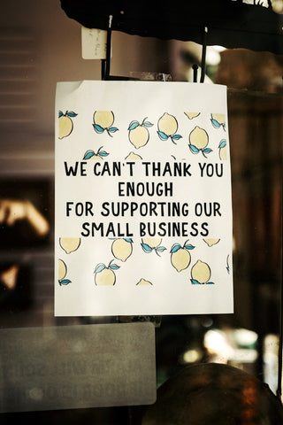 sign saying thanks for supporting small business