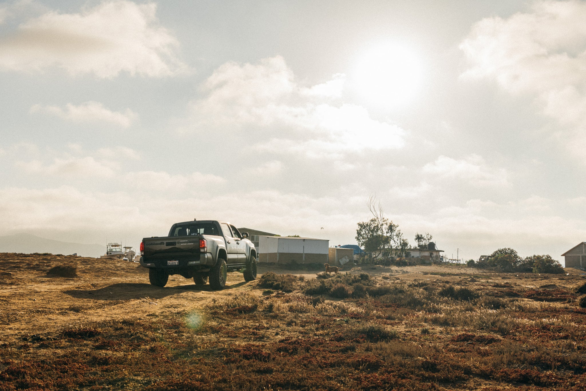 Cobian truck driving a dirt road