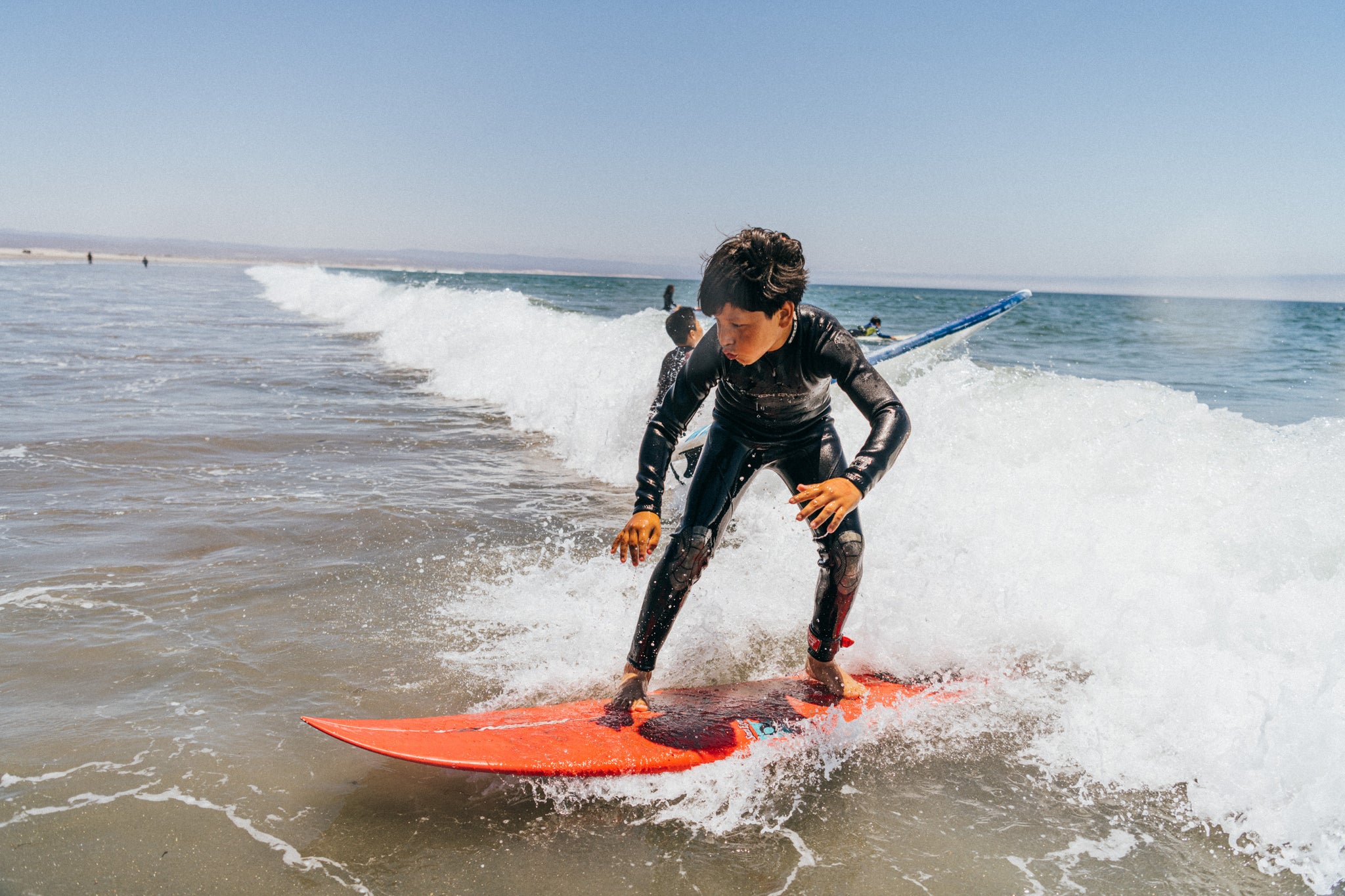 A kid surfing