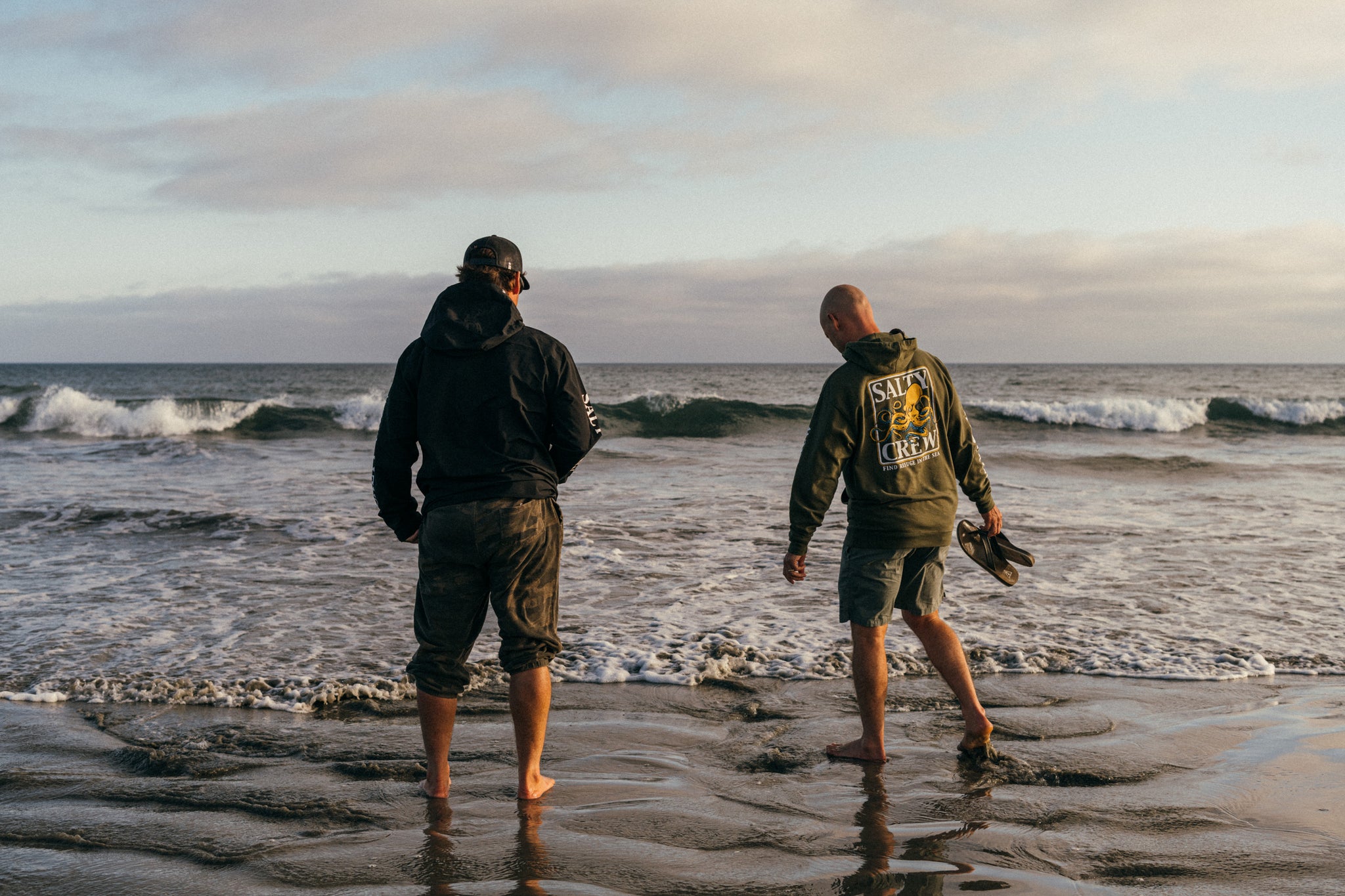 CJ and Damien walking the shore