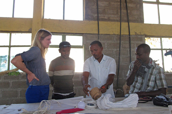 Katja Hettler and Firew Konjo with his team at Janocraft, Ethiopia