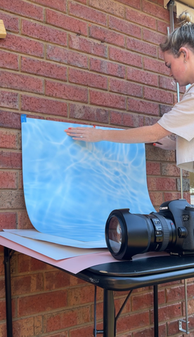 behind the scenes image of product photography at home