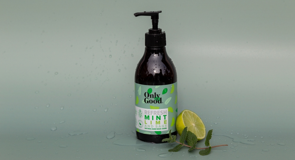 Hand moisturiser pump bottle against sage green backdrop