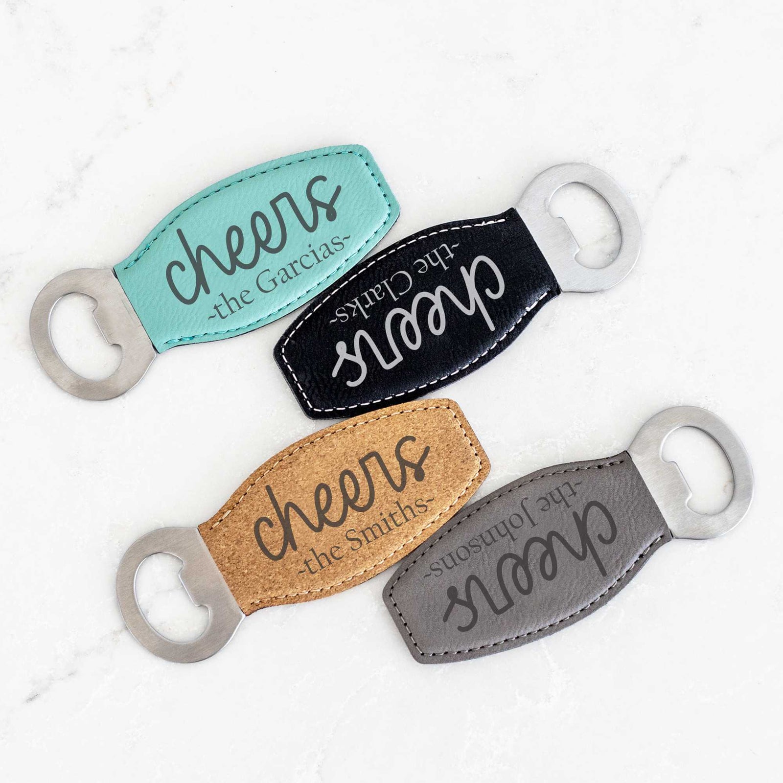 https://cdn.shopify.com/s/files/1/0570/4935/0281/files/Cheers-Bottle-Opener-With-Magnet-All-Colors-Shown_1600x.jpg?v=1684514435