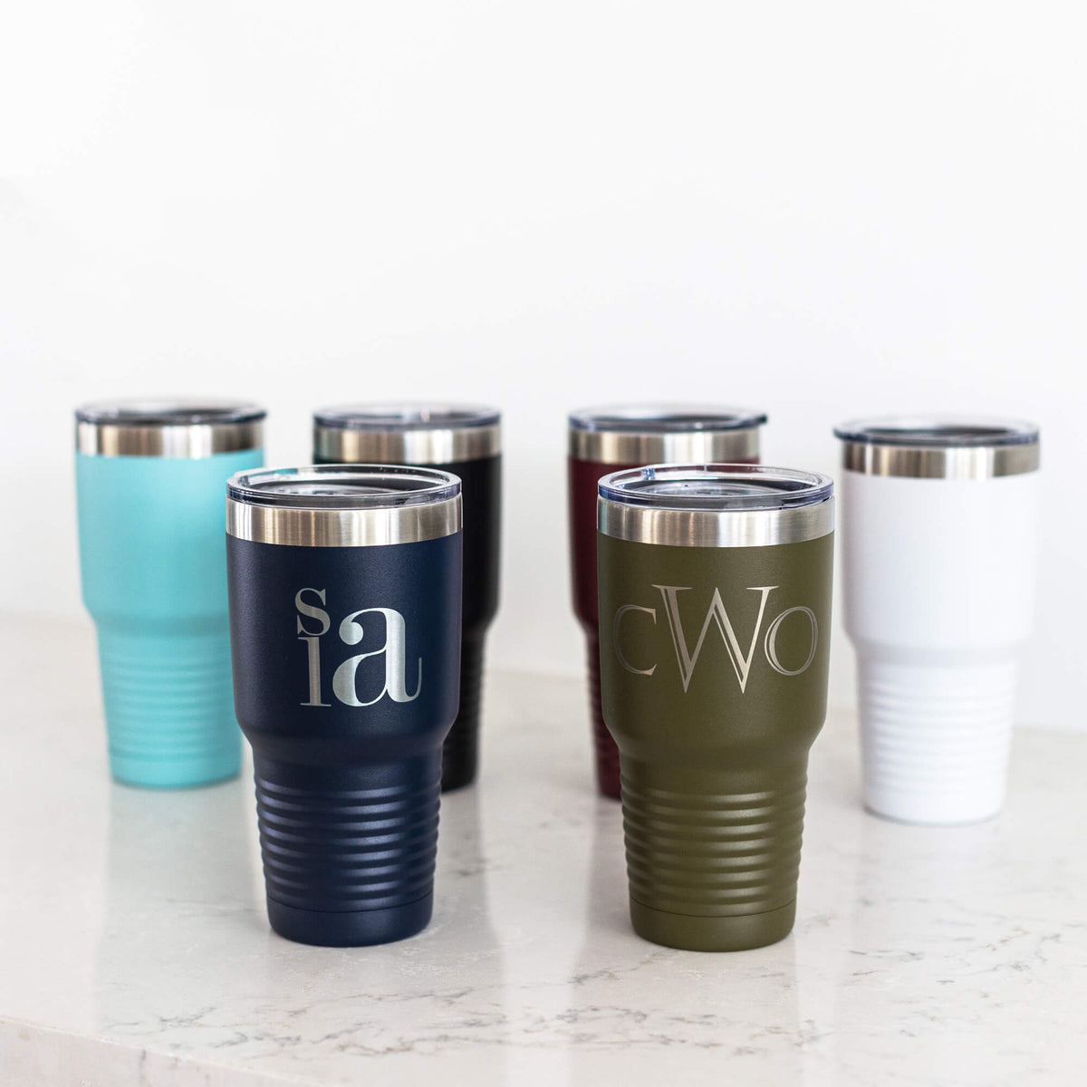 https://cdn.shopify.com/s/files/1/0570/4935/0281/products/Ringneck-Tumblers-Monogram-Group_1200x.jpg?v=1682043956