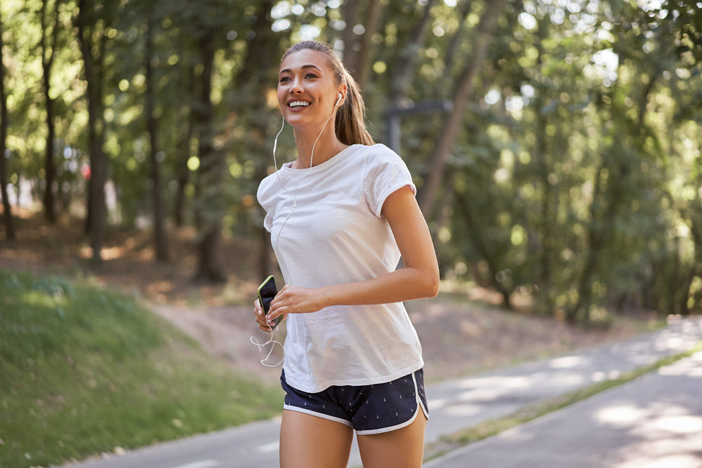 Woman running in the park to improve her lifestyle - NSW CPAP