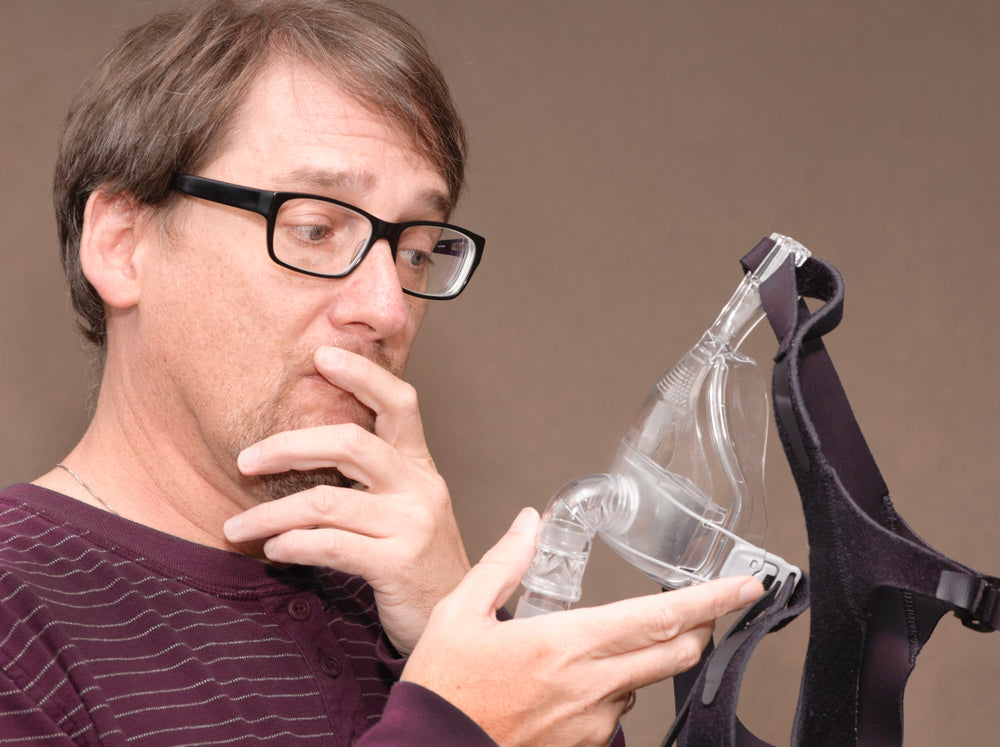 Man thinking if he has the right CPAP Mask for the sleep apnea therapy - CPAP Depot