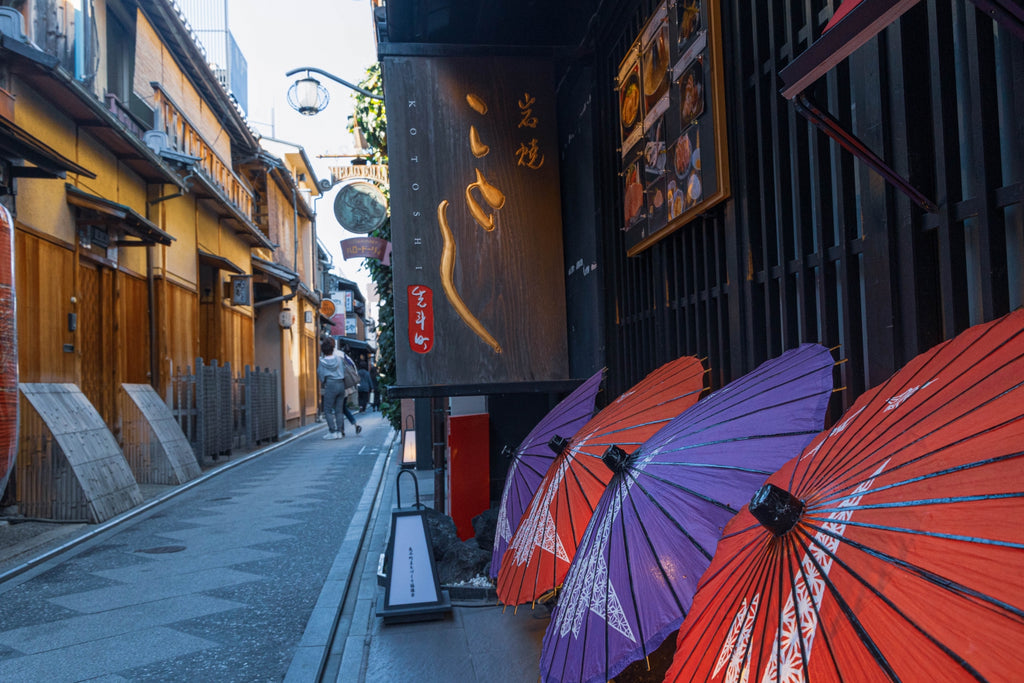 Japanese umbrellas shown on the old town in Kyoto